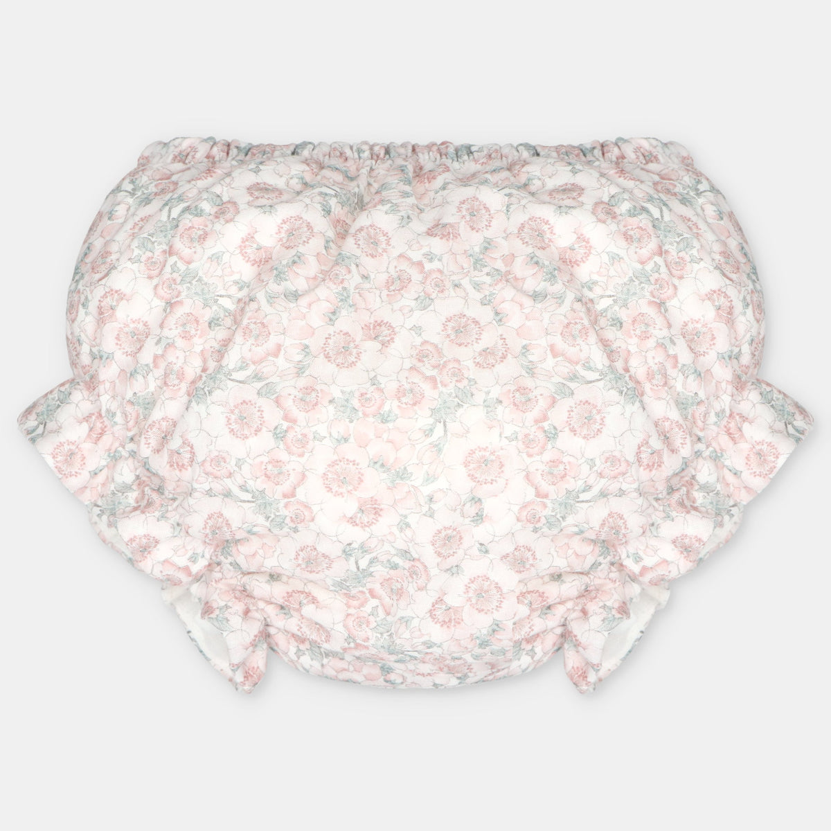 Cubrepañal del conjunto exclusivo floral para bebé.