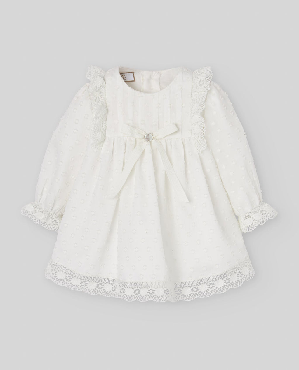 Vestido del conjunto exclusivo PAZ de plumeti para bebé.