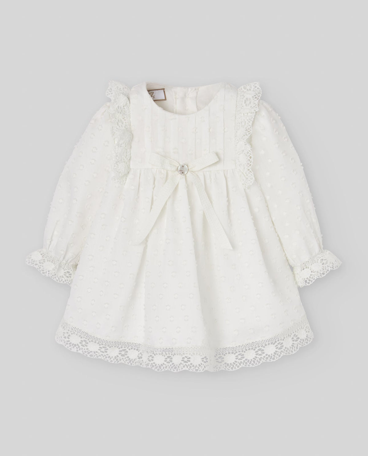 Vestido del conjunto exclusivo PAZ de plumeti para bebé.